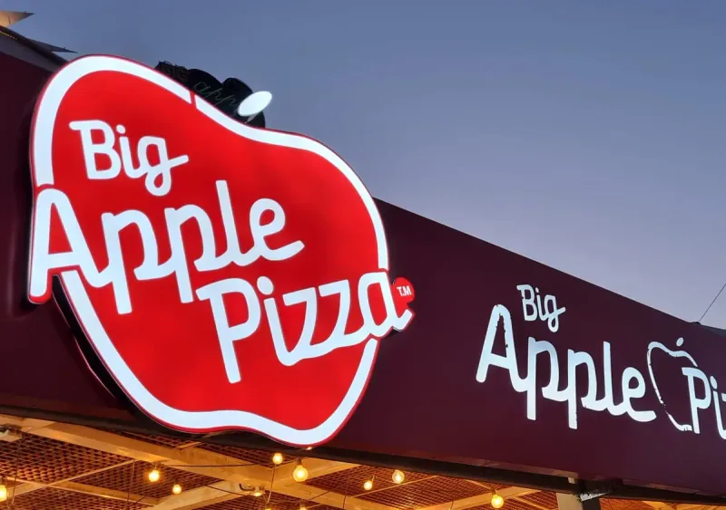 Shaped illuminated logo sign on an aluminum plate with iron construction — SignWorks